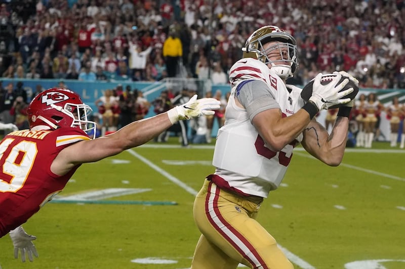 San Francisco 49ers tight end  George Kittle carries the ball. AFP