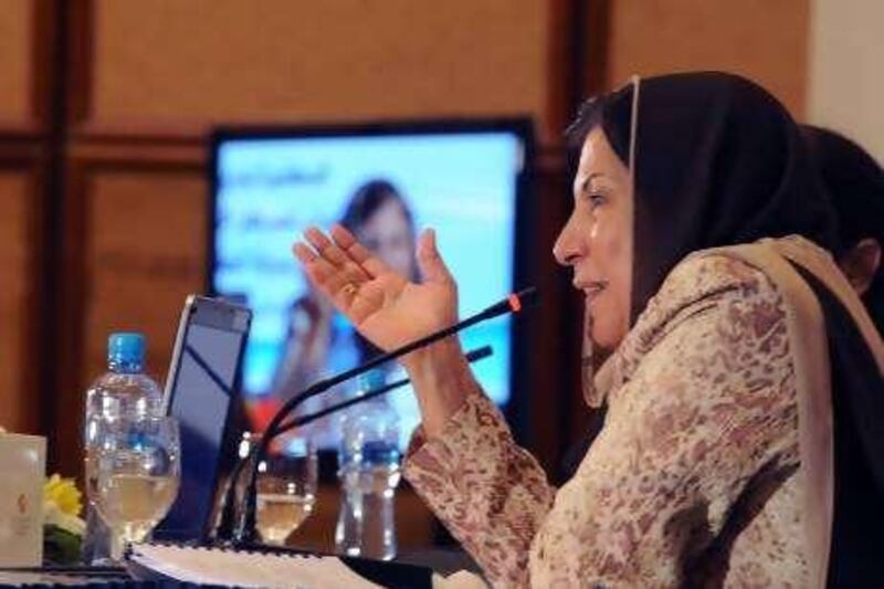 Badria al Awadhi, well-known Kuwaiti womenÕs activist and  
lawyer, speaks during a recent discussion on the role of women in  Bahrain's upcoming election
Credit: Mazen Mahdi for The National