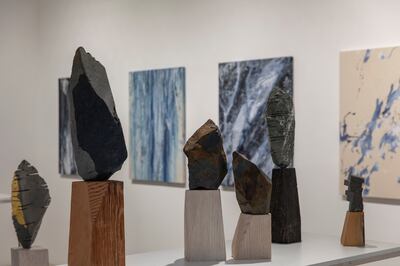 The stones, mostly basalt from Hawaii, are cut to reveal their texture which Kamran Samimi carefully paints with gold leaf or indigo pigments. Photo: The Third Line