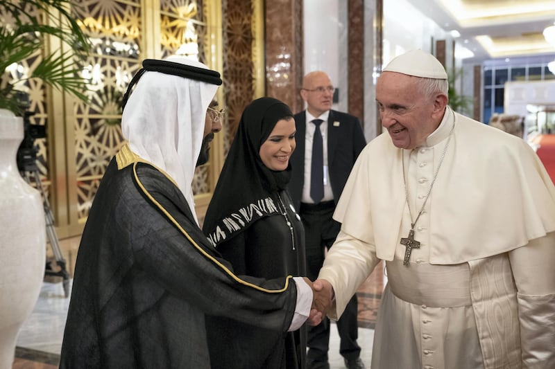 ABU DHABI, UNITED ARAB EMIRATES - February 3, 2019: Day one of the UAE Papal visit -HH Sheikh Tahnoon bin Mohamed Al Nahyan, Ruler's Representative in Al Ain Region (L) greets  His Holiness Pope Francis, Head of the Catholic Church (R) , at the Presidential Airport. 

( Ryan Carter / Ministry of Presidential Affairs )
---