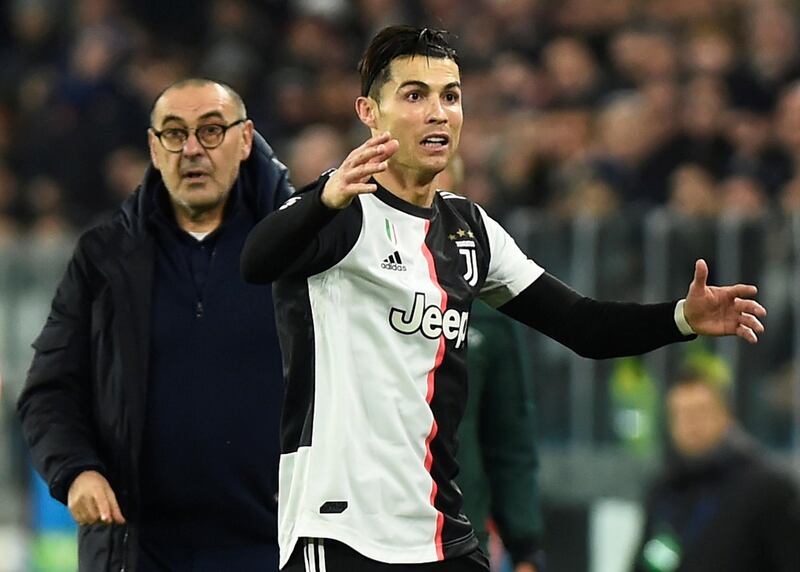 Cristiano Ronaldo and Juventus coach Maurizio Sarri during the game. Reuters