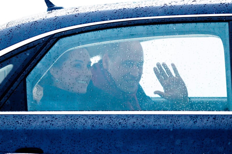 Britain's Catherine, Duchess of Cambridge, left, and Prince William, Duke of Cambridge wave as they arrive at Gardermoen Air Force Base north of Oslo. Cornelius POPPE / AFP