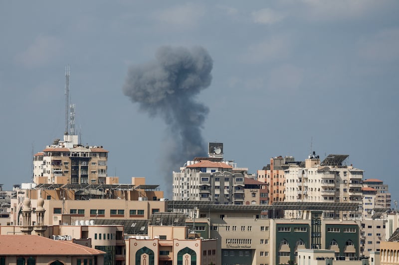 Smoke rises over Gaza City on a second day of Israeli air strikes. Reuters