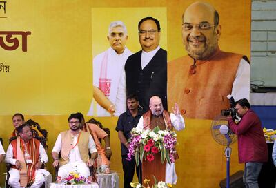 epa07885550 President of the Bharatiya Janata Party (BJP) Amit Shah (C) delivers a lecture during a mass gathering in Kolkata, eastern India, 01 October 2019. BJP President given lecture about National Register of Citizens (NRC) issue in Kolkata. National Register of Citizens (NRC) final draft was released on 31 August in Assam state of India, and resulted in exclusion of 1.9 million people from Assam.  EPA/PIYAL ADHIKARY