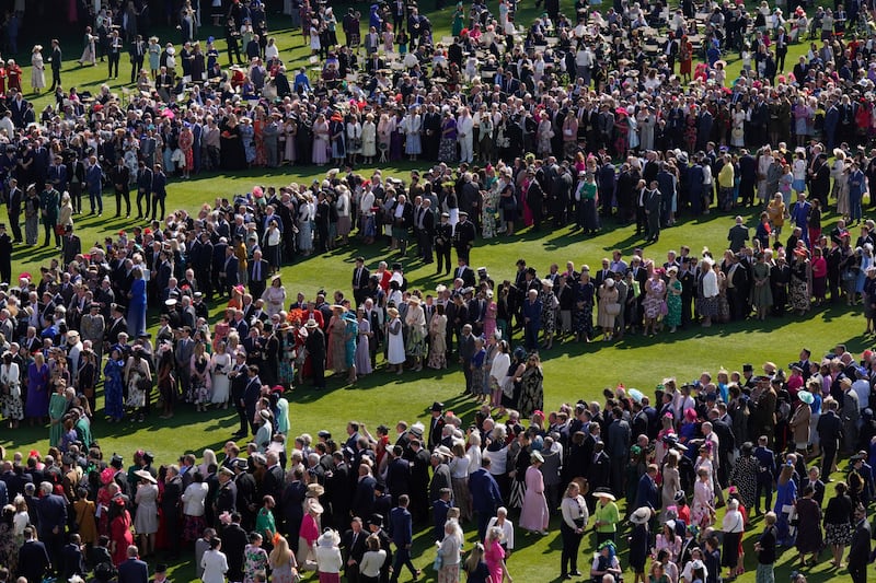 Guests at the garden party to celebrate the coronation of King Charles III and the Queen Consort. AP