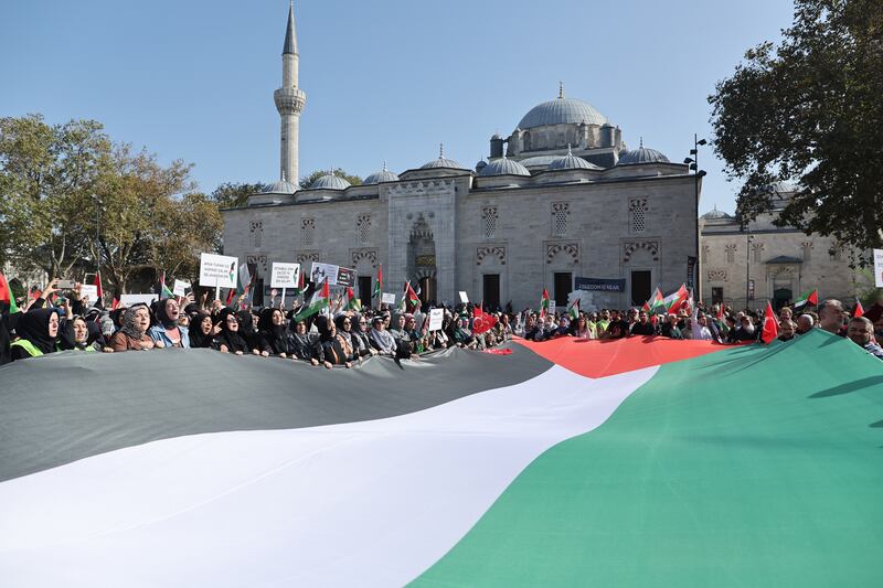 Protesters with a giant Palestinian flag during a demonstration against Israel following Friday prayers in Istanbul last week. EPA