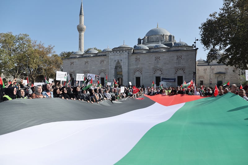 Protesters with a giant Palestinian flag during a demonstration against Israel following Friday prayers in Istanbul last week. EPA