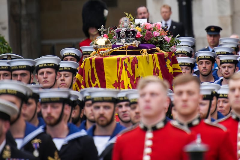 The coffin of Queen Elizabeth II is placed on a gun carriage for her state funeral service in central London. AP