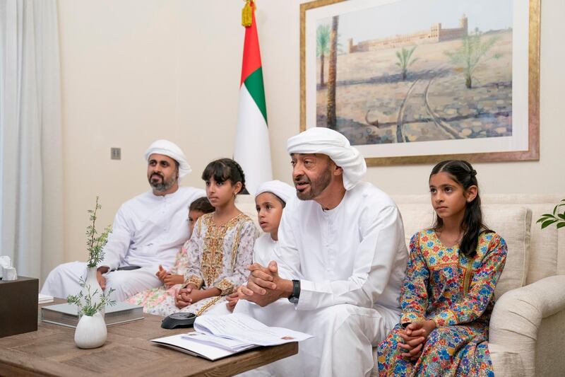 ABU DHABI, UNITED ARAB EMIRATES - May 19, 2020: HH Sheikh Mohamed bin Zayed Al Nahyan, Crown Prince of Abu Dhabi and Deputy Supreme Commander of the UAE Armed Forces (2nd R), participates in an online lecture by HE Obaid Rashid Al Shamsi, Director-General of the National Emergency Crisis and Disaster Management Authority, titled “Honoring Our Traditions, Valuing Our Safety”. The lecture was broadcast on Al Emarat Channel as part of the Ramadan lecture series of Majlis Mohamed bin Zayed. Seen with HH Sheikha Shamma bint Khaled bin Mohamed bin Zayed Al Nahyan (R),  HH Sheikh Mohamed bin Nahyan bin Saif Al Nahyan (3rd R), HH Sheikha Fatima bint Mohamed bin Hamad bin Tahnoon Al Nahyan (4th R) and HH Sheikh Theyab bin Mohamed bin Zayed Al Nahyan, Abu Dhabi Executive Council member and Chairman of the abu Dhabi Crown Prince Court (CPC) (L).

( Hamad Al Kaabi / Ministry of Presidential Affairs )​
---