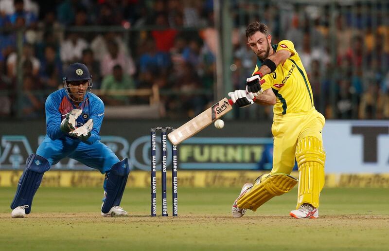 Australia's Glenn Maxwell, right, plays a shot during the second T20 international cricket match between India and Australia in Bangalore, India, Wednesday, Feb. 27, 2019. (AP Photo/Aijaz Rahi)