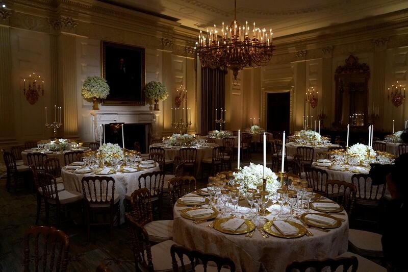 Tables for the State Dinner for French President Emmanuel Macron are shown in the State Dining Room of the White House in Washington, US, April 23, 2018. Joshua Roberts / Reuters