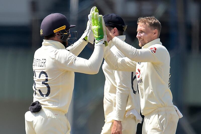 Joe Root takes the wicket of Lasith Ambuldeniya.