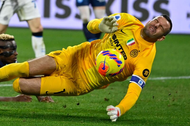 Inter Milan goalkeeper Samir Handanovic makes a save against Napoli. AFP