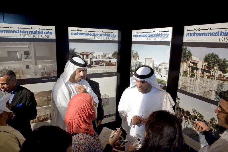 Mohammed Al Khayat, the head of commercial and free zone development at Meydan, left, and Saeed Al Tayer, the chairman of Meydan, during the launch of the first stage of Mohammed bin Rashid City. Antonie Robertson / The National