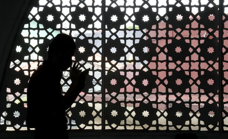 An Indonesian during Friday prayers at the Baiturrahman Mosque in Depok, West Java, Indonesia. EPA