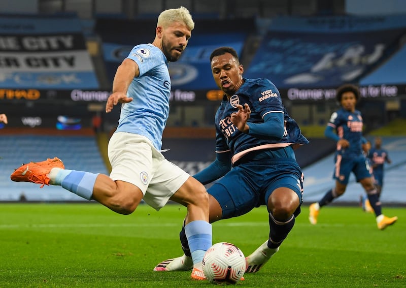 Manchester City attacker Sergio Aguero under pressure from Gabriel of Arsenal during City's 1-0 win in the Premier League. EPA