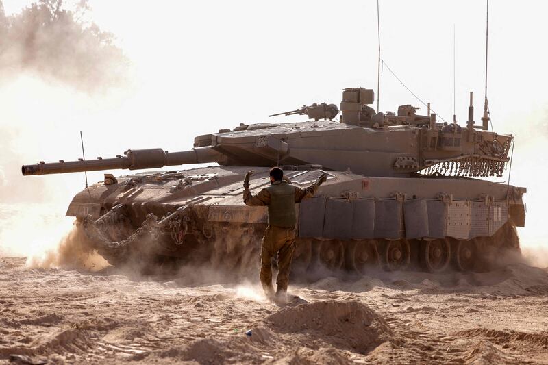 Israeli forces at a position along the the border with Gaza. AFP