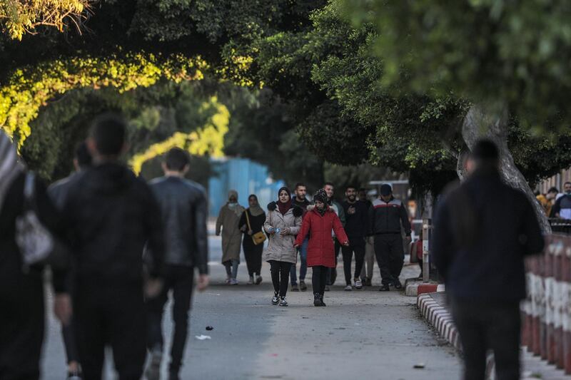 Palestinians walk in the streets after the authorities eased restrictions put in place to stop the spread of the COVID-19, amid a coronavirus lockdown in Gaza City. The Ministry of Interior in Gaza City announced on 05 December 2020 full lockdown on Fridays and Saturdays until further notice to curb the spread of COVID-19.  EPA