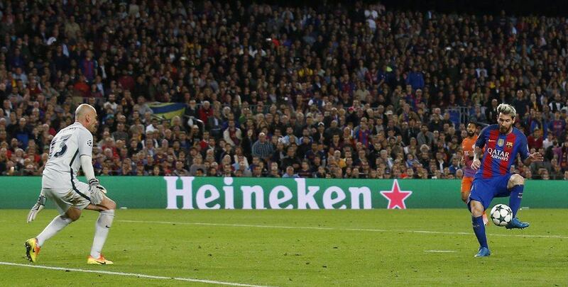 Barcelona’s Lionel Messi scores their third goal to complete his hat-trick. Albert Gea / Reuters