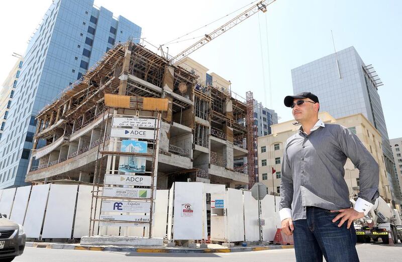 Cyrus Hodes at a building site in Al Nahyan, Abu Dhabi, where the robot parking system will be integrated into the building’s structure. ParkPlus, the operator, says the system is a first for the GCC. Pawan Singh / The National
