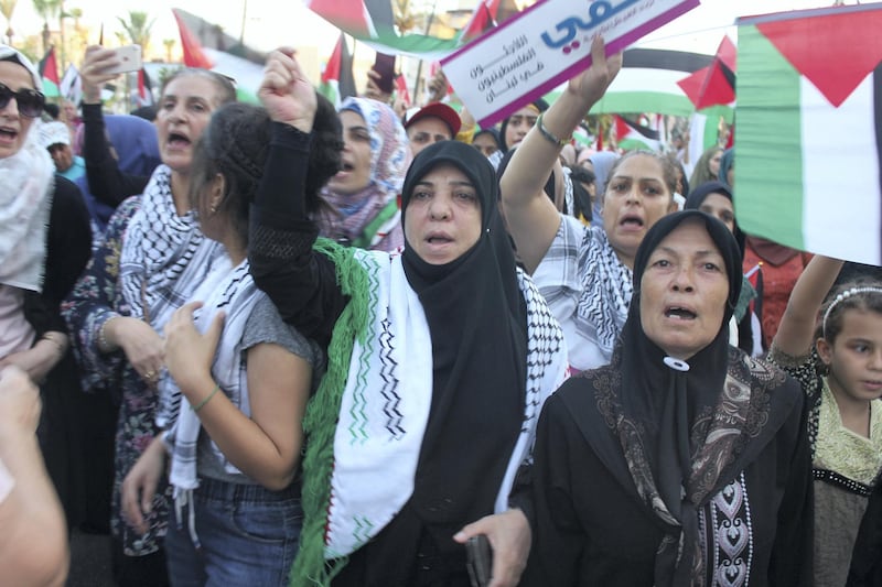 Thousands of Palestinians and Lebanese marched in the southern city of Saida on Tuesday. Lizzie Porter / The National