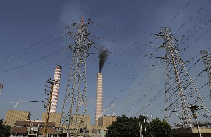 Smoke billows from one of the chimneys of Lebanon's Zouk Mosbeh power plant, north of the capital Beirut, on April 9, 2019. The Lebanese cabinet has approved a plan to restructure the country's ailing electricity sector vowing to provide power 24 hours a day from a grid notorious for blackouts. / AFP / JOSEPH EID
