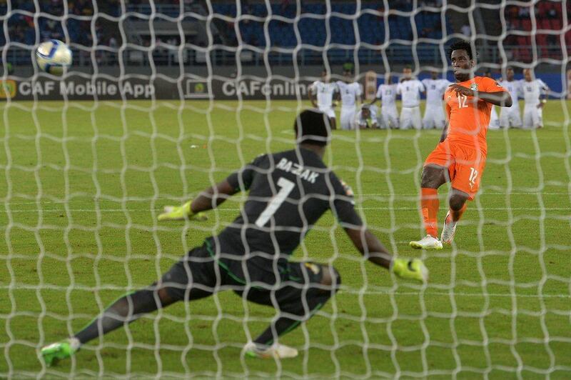 Ivory Coast forward Wilfried Bony, right, misses his penalty during the shootout against Ghana in the Africa Cup of Nations final on Sunday. Ivory Coast missed their first two shots, before Ghana missed their third and fourth shots, and the Ivorians eventually won the shootout 9-8. Khaled Desouki / AFP