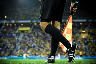 epa08405485 (FILE) - A linesman during the German Bundesliga soccer match between Borussia Dortmund and RB Leipzig in Dortmund, Germany, 26 August 2018 (re-issued on 06 May 2020). The German Bundesliga is set to resume the 2019-20 season in the second half of May amid the ongoing coronavirus COVID-19 pandemic, as a result of a German government meeting of Chancellor Angela Merkel and the state prime ministers in Berlin, media reports claimed on 06 May 2020. EPA/SASCHA STEINBACH *** Local Caption *** 54579710