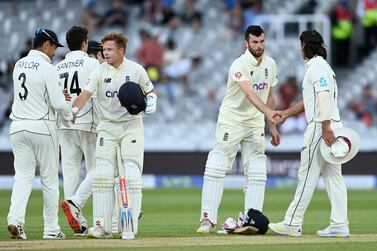 Ollie Pope and Dom Sibley of England shake hands with Ross Taylor and Colin de Grandhomme of New Zealand after the Lord's Test ended in a draw on Sunday. Getty