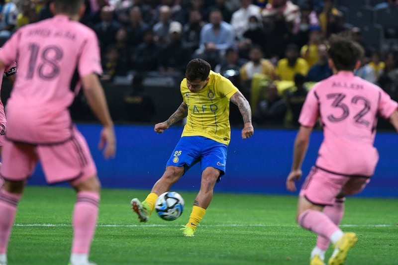 Otavio of Al Nassr in action against Jordi Alba and Noah Allen of Inter Miami. EPA