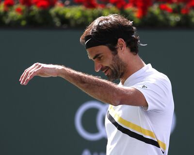 epa06613499 Roger Federer from Switzerland reacts during his finals match against Juan Martin Del Potro from Argentina at the BNP Paribas Open at the Indian Wells Tennis Garden in Indian Wells, California, USA, 18 March 2018.  EPA/MIKE NELSON