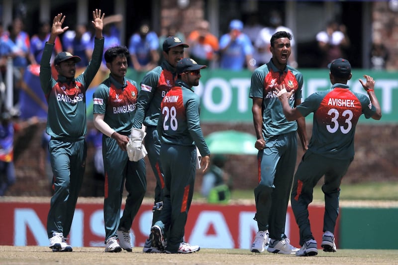 Bangladesh's Shoriful Islam (2nd R) celebrates with teammates after the dismissal of India's Siddhesh Veer during the ICC Under-19 World Cup cricket finals between India and Bangladesh at the Senwes Park, in Potchefstroom, on February 9, 2020. (Photo by MICHELE SPATARI / AFP)