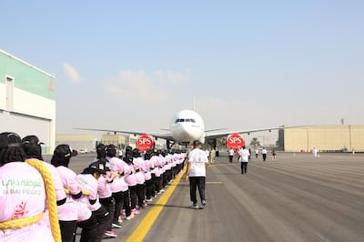 Dubai Police set a Guinness World Record by pulling an Emirates Boeing 777 plane 100 metres. Courtesy Dubai Police