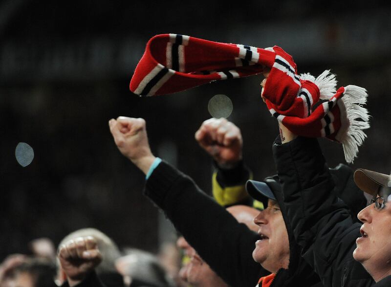 epa03673287 A Manchester United fan celebrates after the English Premier League match between Manchester United and Aston Villa at the Old Trafford stadium in Manchester, Britain, 22 April 2013. Manchester United beat Aston Villa 3-0 to claim their 20th league title.  EPA/PETER POWELL DataCo terms and conditions apply.  https://www.epa.eu/downloads/DataCo-TCs.pdf *** Local Caption ***  03673287.jpg