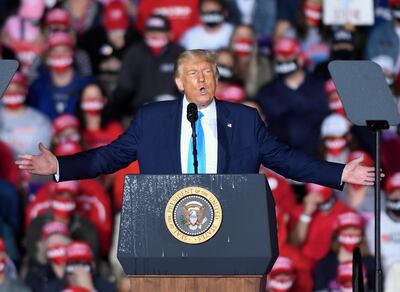 In this Sept. 26, 2020, file photo, President Donald Trump speaks during a campaign rally at Harrisburg International Airport in Middletown, Pa. President Trump and first lady Melania Trump have tested positive for the coronavirus, the president tweeted early Friday. (AP Photo/Steve Ruark, File)