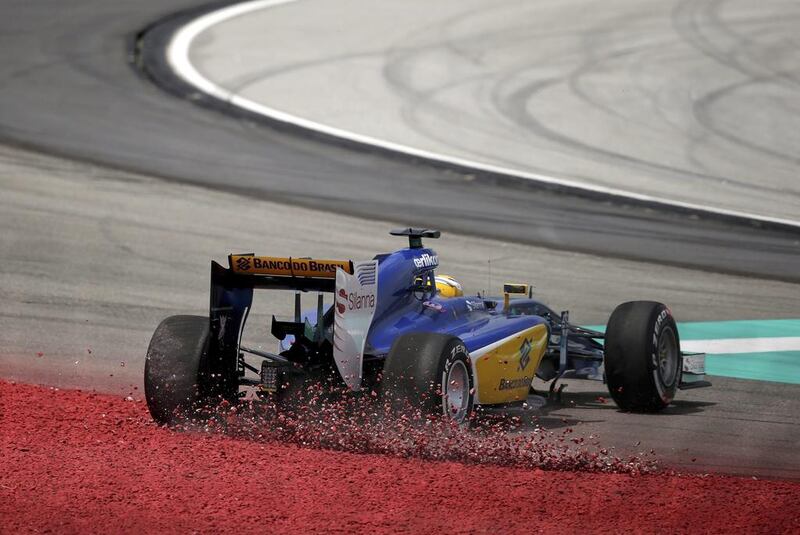 Sauber driver Marcus Ericsson spins out from the track. The safety car duly followed. Andy Wong / AP Photo