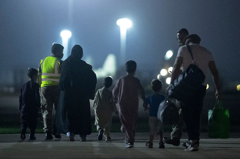 Evacuees flown out of Afghanistan land at RAF Brize Norton air base in southern England on August 24, shortly after the fall of Kabul to the Taliban. Chaos in the UK's Foreign Office is being blamed for many Afghans being left behind. Photo: AFP
