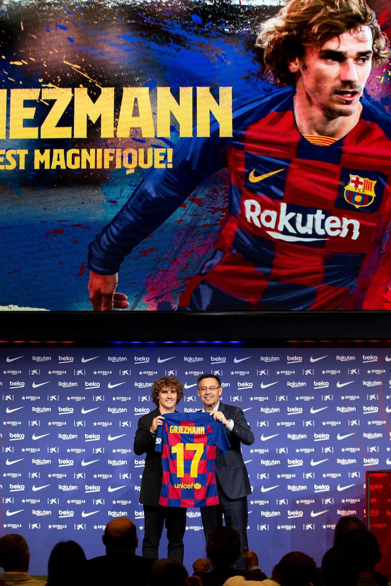 French striker Antoine Griezmann Barcelona president Josep Maria Bartomeu pose for the media. EPA