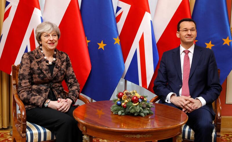 Poland’s Prime Minister Mateusz Morawiecki meets with Britain’s Prime Minister Theresa May in the Belvedere Palace in Warsaw, Poland December 21, 2017. REUTERS/Kacper Pempel