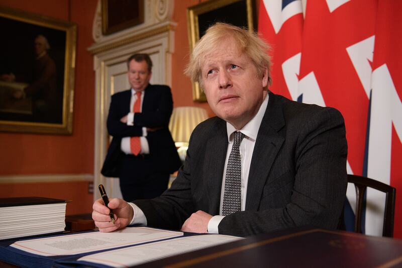 Boris Johnson after signing a Brexit trade deal with the EU in December 2020. Getty Images