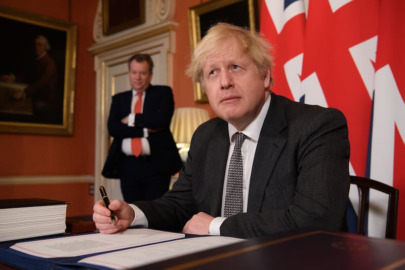 Boris Johnson after signing a Brexit trade deal with the EU in December 2020. Getty Images