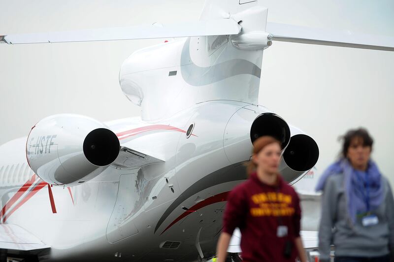A Dassault Falcon airplane is moved on the tarmac at the Paris International Air Show -- June 14, 2013 -- . (Antoine Antoine for The National) *** Local Caption ***  Paris Air Show027.JPG