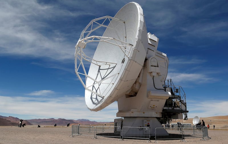 FILE PHOTO: A parabolic antenna of the ALMA (Atacama Large Millimetre/Submillimetre Array) project is seen at the El Llano de Chajnantor in the Atacama desert, some 1730 km (1074 miles) north of Santiago and 5000 meters above sea level, March 12, 2013. REUTERS/Ivan Alvarado/File Photo