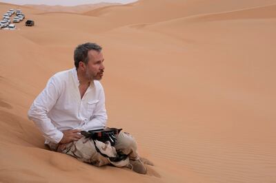 Denis Villeneuve in the Liwa desert filming Dune. Photo: Abu Dhabi Film Commission