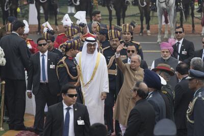 Sheikh Mohamed, Crown Prince of Abu Dhabi and Deputy Supreme Commander of the UAE Armed Forces at the time, Narendra Modi, Prime Minister of India, right, and Pranab Mukherjee, President of India, second right, attend the India Republic Day Parade in 2017, on Rajpath, New Delhi. Mohamed Al Hammadi / Crown Prince Court - Abu Dhabi