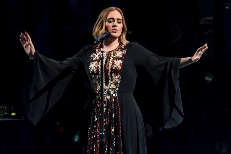 GLASTONBURY, ENGLAND - JUNE 25:  Adele performs on The Pyramid Stage on day 2 of the Glastonbury Festival at Worthy Farm, Pilton on June 25, 2016 in Glastonbury, England. Now its 46th year the festival is one largest music festivals in the world and this year features headline acts Muse, Adele and Coldplay. The Festival, which Michael Eavis started in 1970 when several hundred hippies paid just Ã‚Â£1, now attracts more than 175,000 people.  (Photo by Ian Gavan/Getty Images)