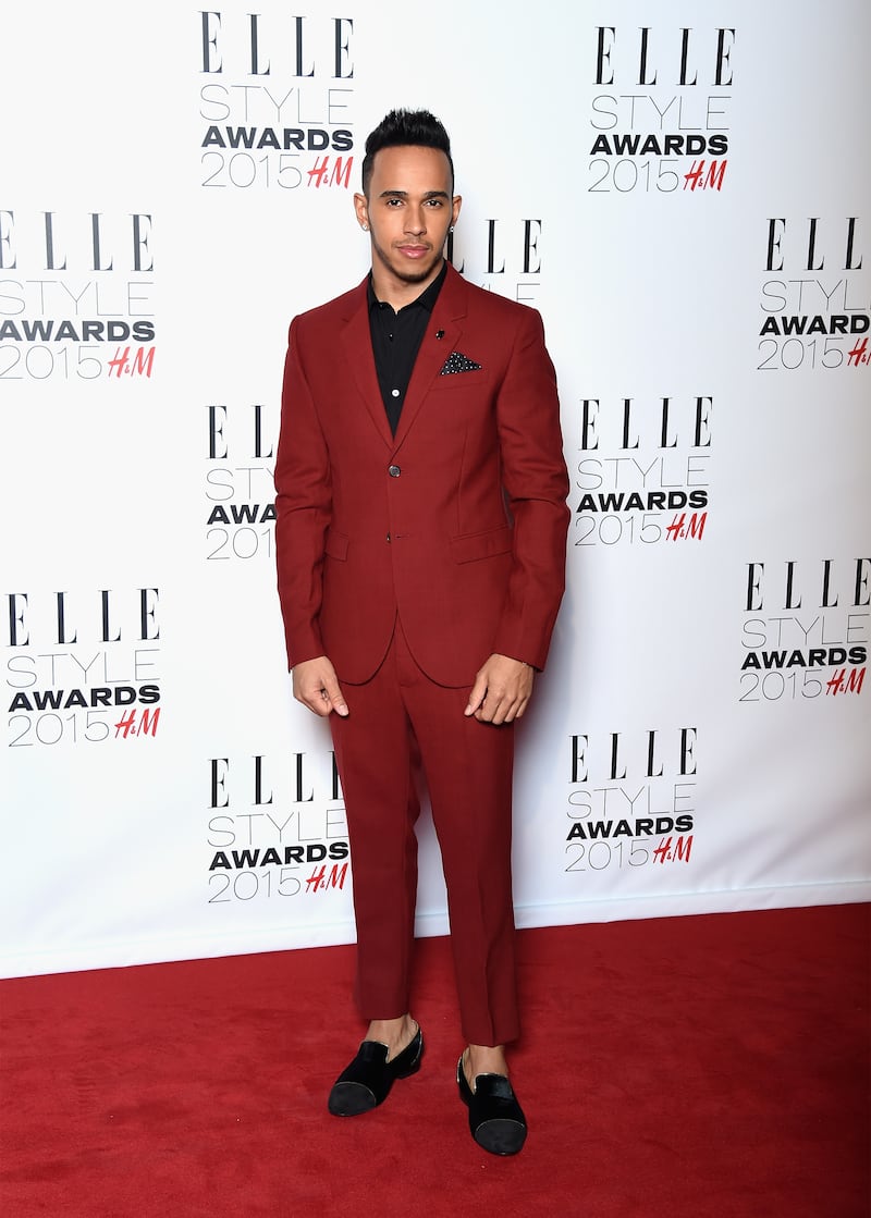 Lewis Hamilton, in a red suit with a black shirt, attends the Elle Style Awards on February 24, 2015, in London. Getty Images