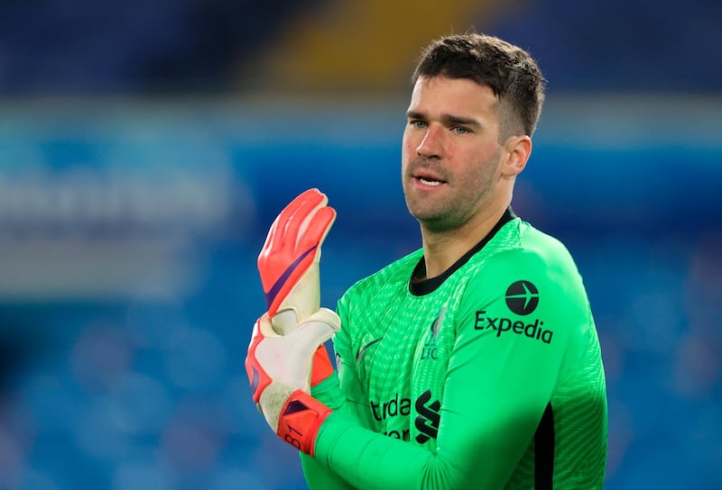 LIVERPOOL RATINGS: Alisson Becker - 7. The Brazilian made a succession of important saves, the best of which was from Harrison. He had no chance with the equaliser. AFP