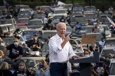 ATLANTA, GA - OCTOBER 27: Democratic presidential nominee Joe Biden speaks during a drive-in campaign rally in the parking lot of Cellairis Ampitheatre on October 27, 2020 in Atlanta, Georgia. Biden is campaigning in Georgia on Tuesday, with scheduled stops in Atlanta and Warm Springs.   Drew Angerer/Getty Images/AFP
== FOR NEWSPAPERS, INTERNET, TELCOS & TELEVISION USE ONLY ==
