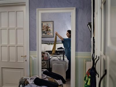 Basma, who travels often for work, prepares her luggage in her bedroom. Basma holds a B.S in Special Education, from Dar Al Hekma University, specializing in the field of the Gifted & Talented. She then obtained her M.A. in Curriculum & Assessment from the University of London in the U.K. 
 
“When I did my university entry tests I realized that my results were high in social sciences subjects. I didn’t really know what I wanted to do back then. I was interested in business but not teaching”